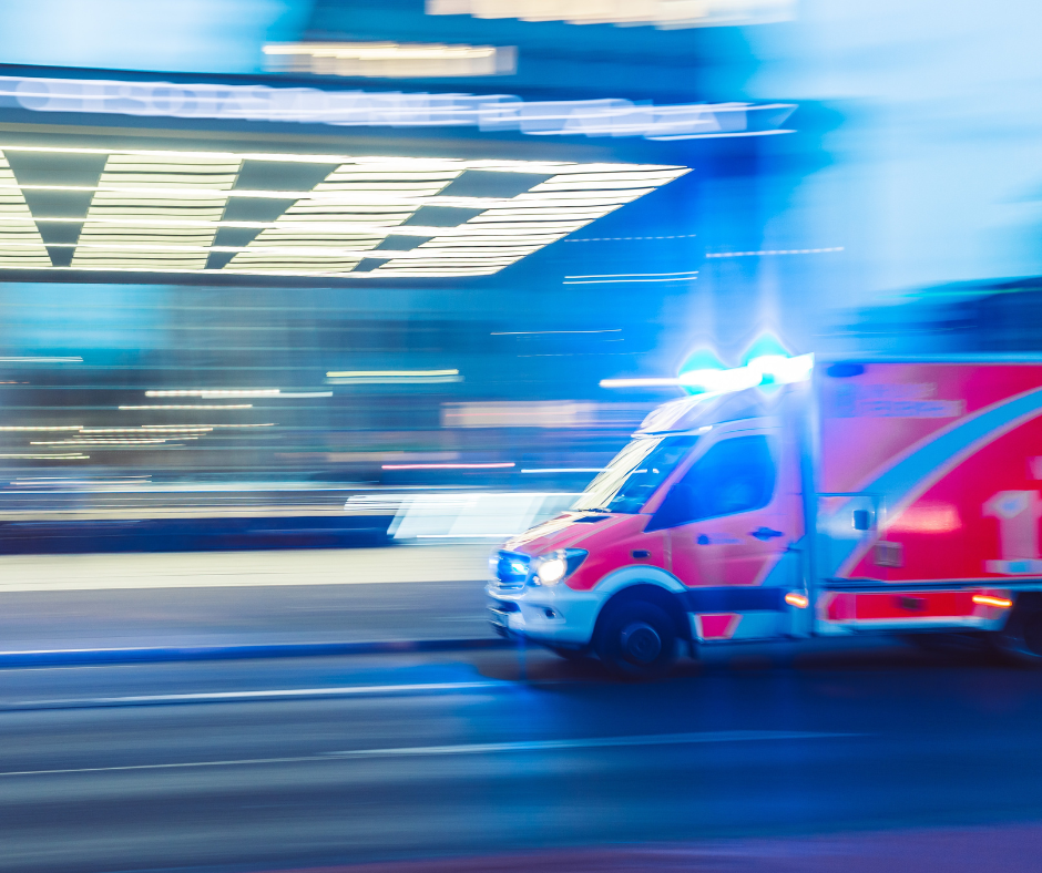 blurry-image-of-red-ambulance-driving