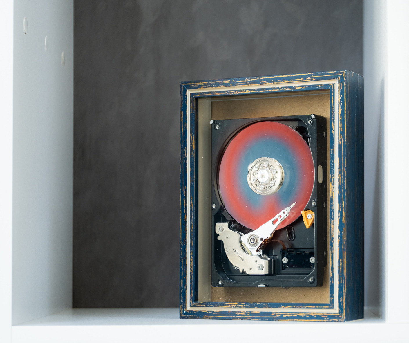 Hard-drive-in-weathered-picture-frame